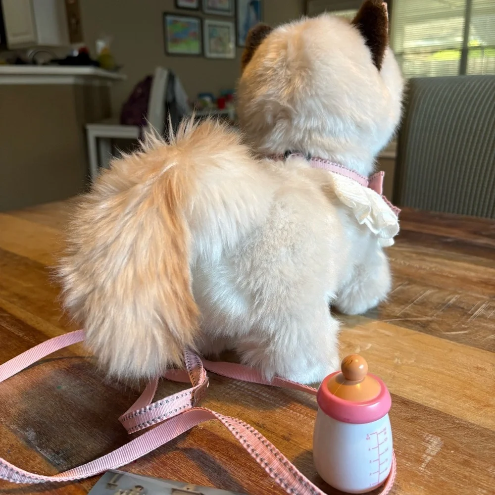 Battery powered Cat Toy that walks, miaus/talks, drinks milk and shakes tail.